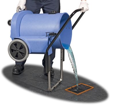 a person using the stand to tip fluid into the drain